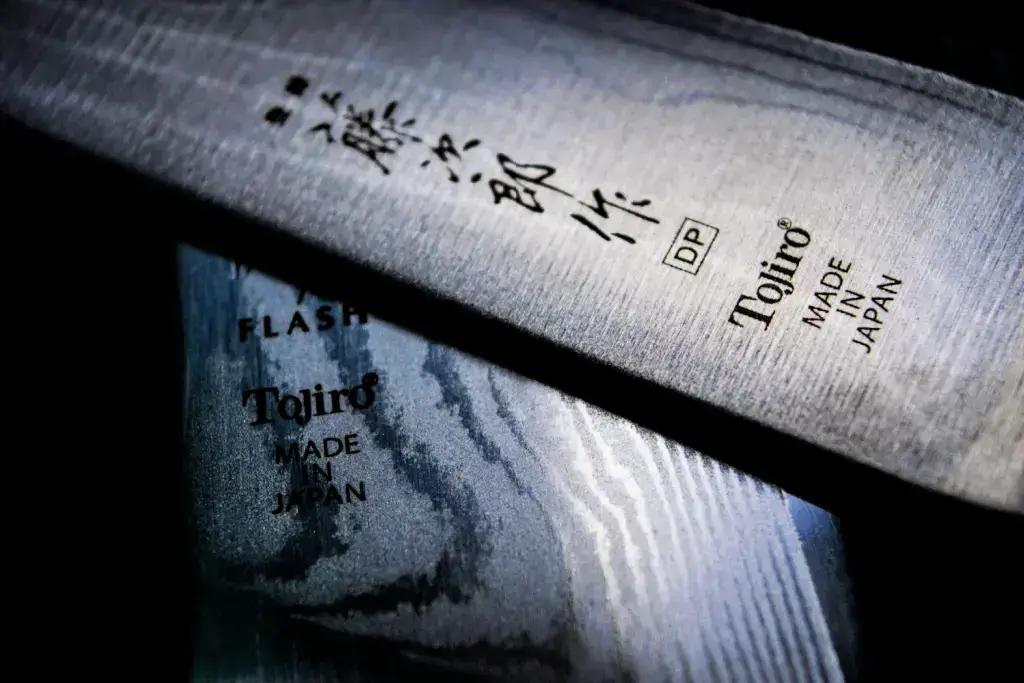 A close up of a Tojiro Knife.